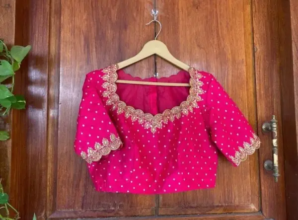Graceful Pink Cutwork Maggam Blouse – A Timeless Elegance