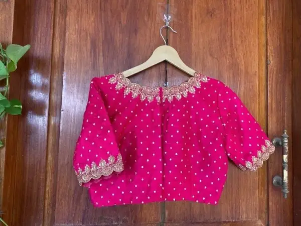 Graceful Pink Cutwork Maggam Blouse – A Timeless Elegance