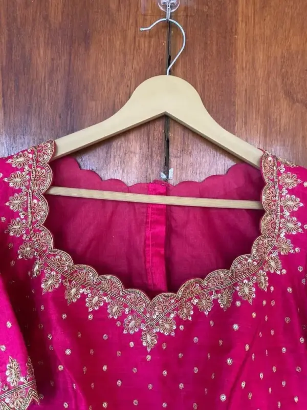 Graceful Pink Cutwork Maggam Blouse – A Timeless Elegance
