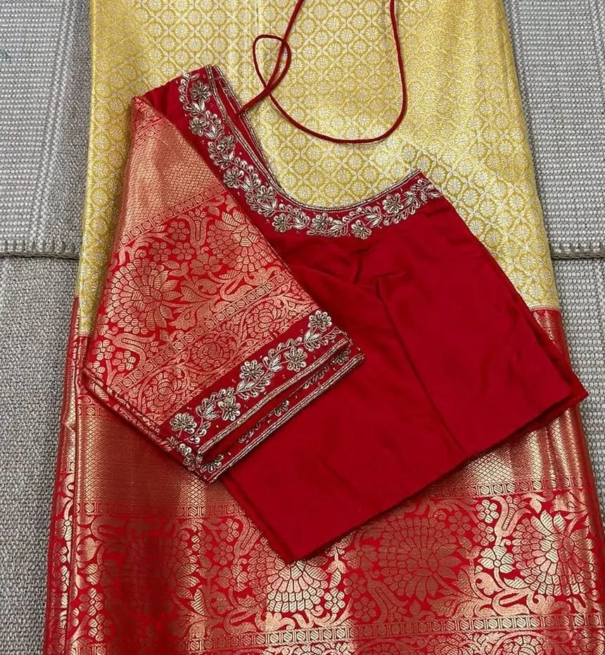 Eye-Catching Red Blouse with Intricate Cutwork Embellishments
