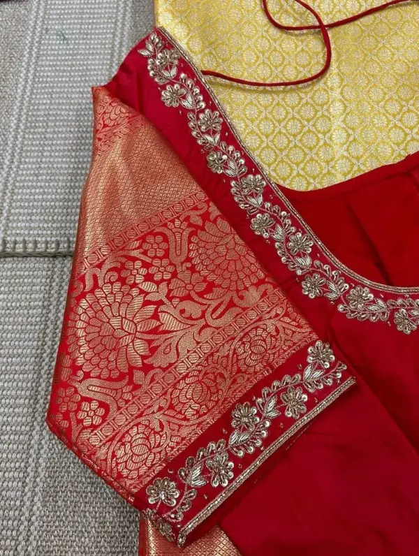 Eye-Catching Red Blouse with Intricate Cutwork Embellishments
