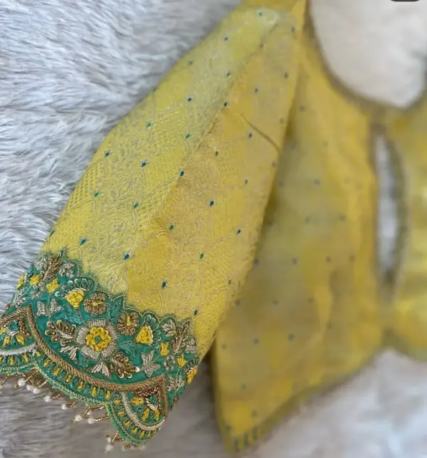 Radiant Lemon Yellow Cutwork Blouse – A Blend of Tradition and Elegance
