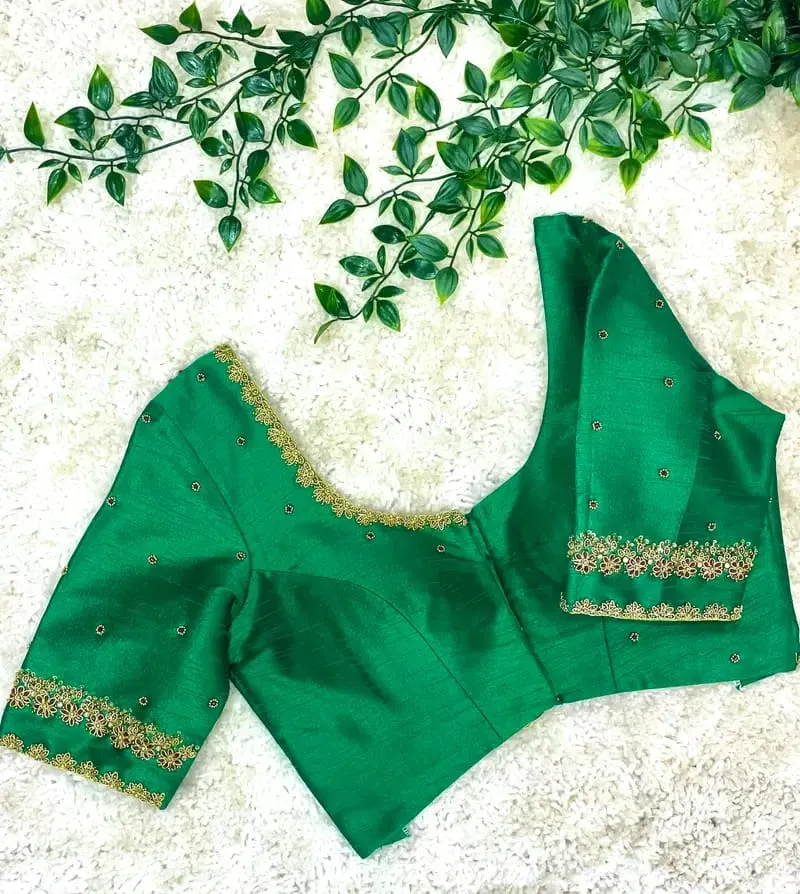 Graceful Charm – Green Net Raw Silk Blouse with Elegant Maggam Touch