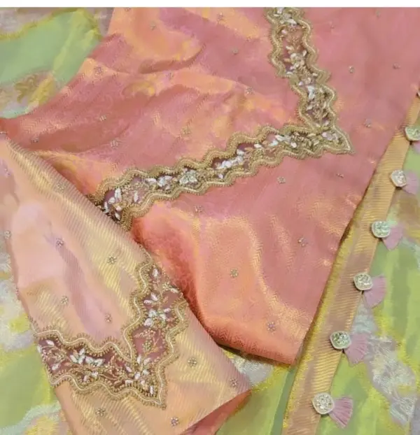 Luxury in Every Stitch – Peach Trendy Maggam Work Net Blouse