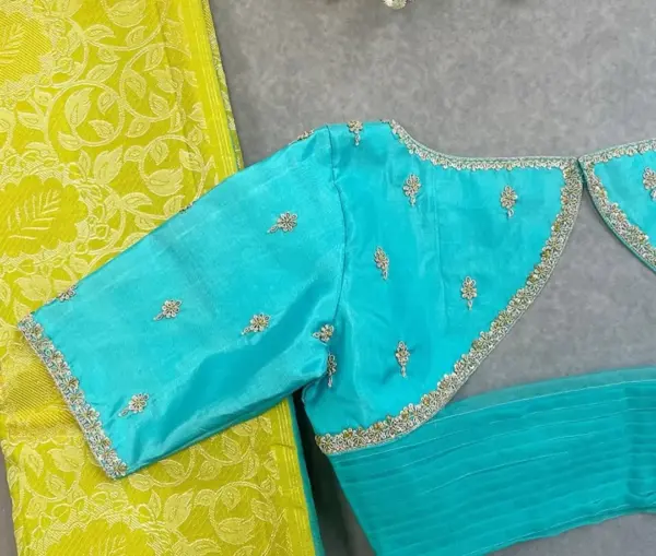 Elegant Sky Blue Net Aariwork Blouse with Designer Neckline – Trending Bridal Pick