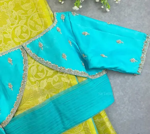 Elegant Sky Blue Net Aariwork Blouse with Designer Neckline – Trending Bridal Pick