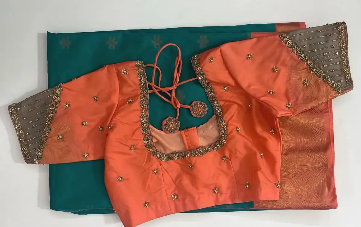 Chic Orange Designer Net Blouse Perfect for Festive Glam