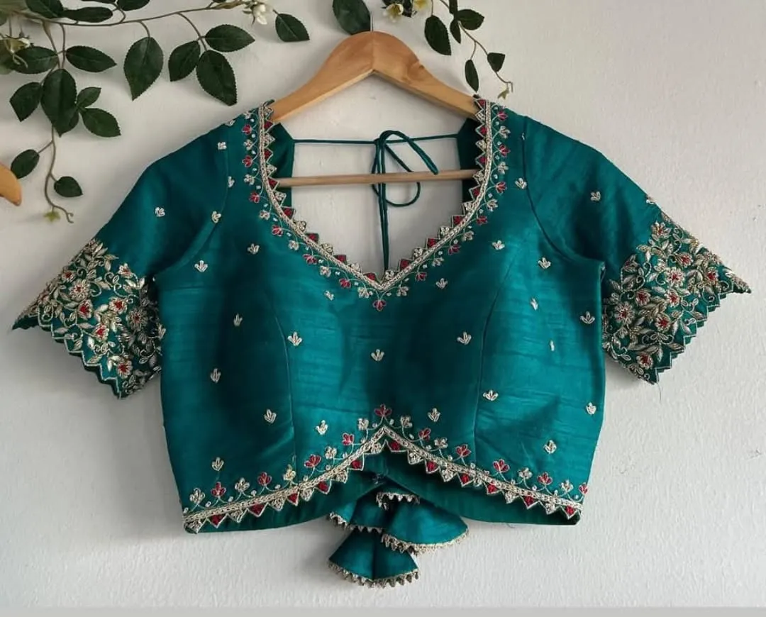 Elite EleganceRama Blue Traditional Maggam Blouse Design