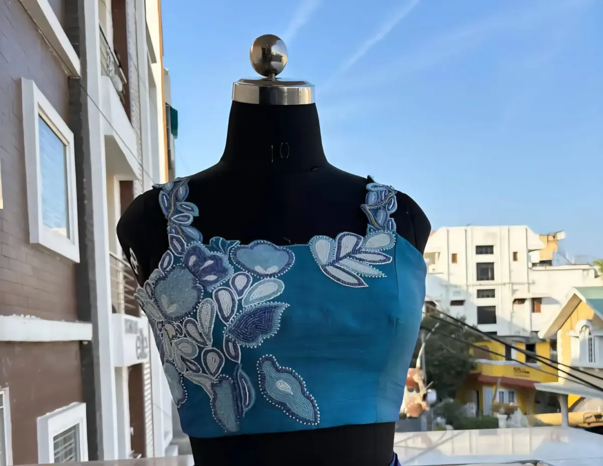 Grace in BlueSleeveless Pearl Work Designer Blouse for Party Glam