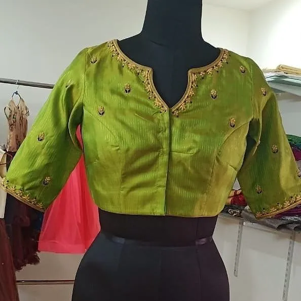Green Trendy V-Neck Maggam Work Blouse Elegant Statement for Every Occasion