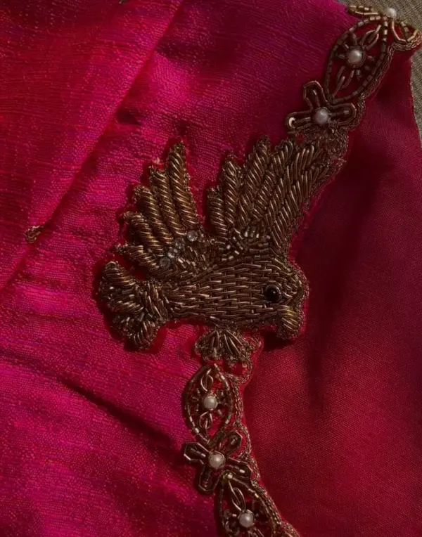 Timeless BeautyHandcrafted Pink Zardosi Peacock Blouse Design