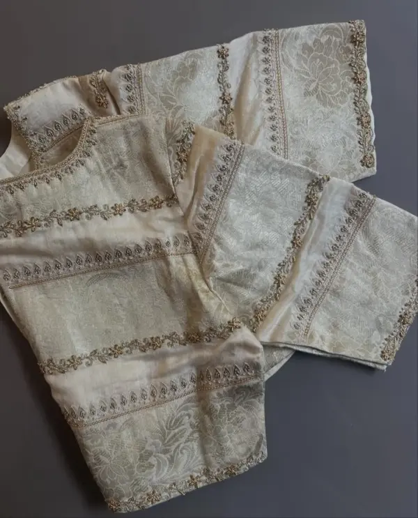 Cream Bridal Maggam Work Blouse with Intricate Lines Design