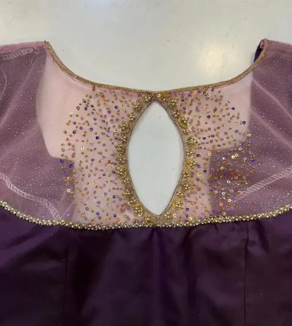 Simple Yet Gorgeous Wine-Coloured Wedding Blouse with Exquisite Maggam Work