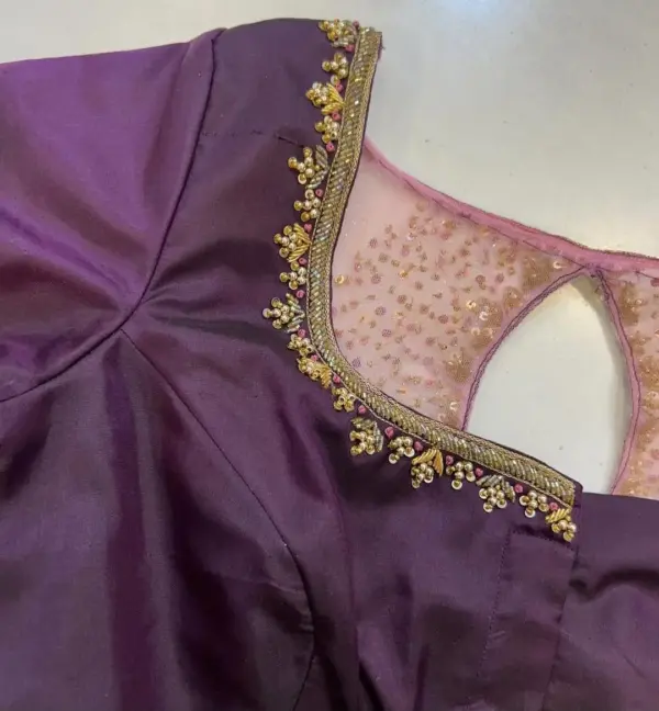 Simple Yet Gorgeous Wine-Coloured Wedding Blouse with Exquisite Maggam Work