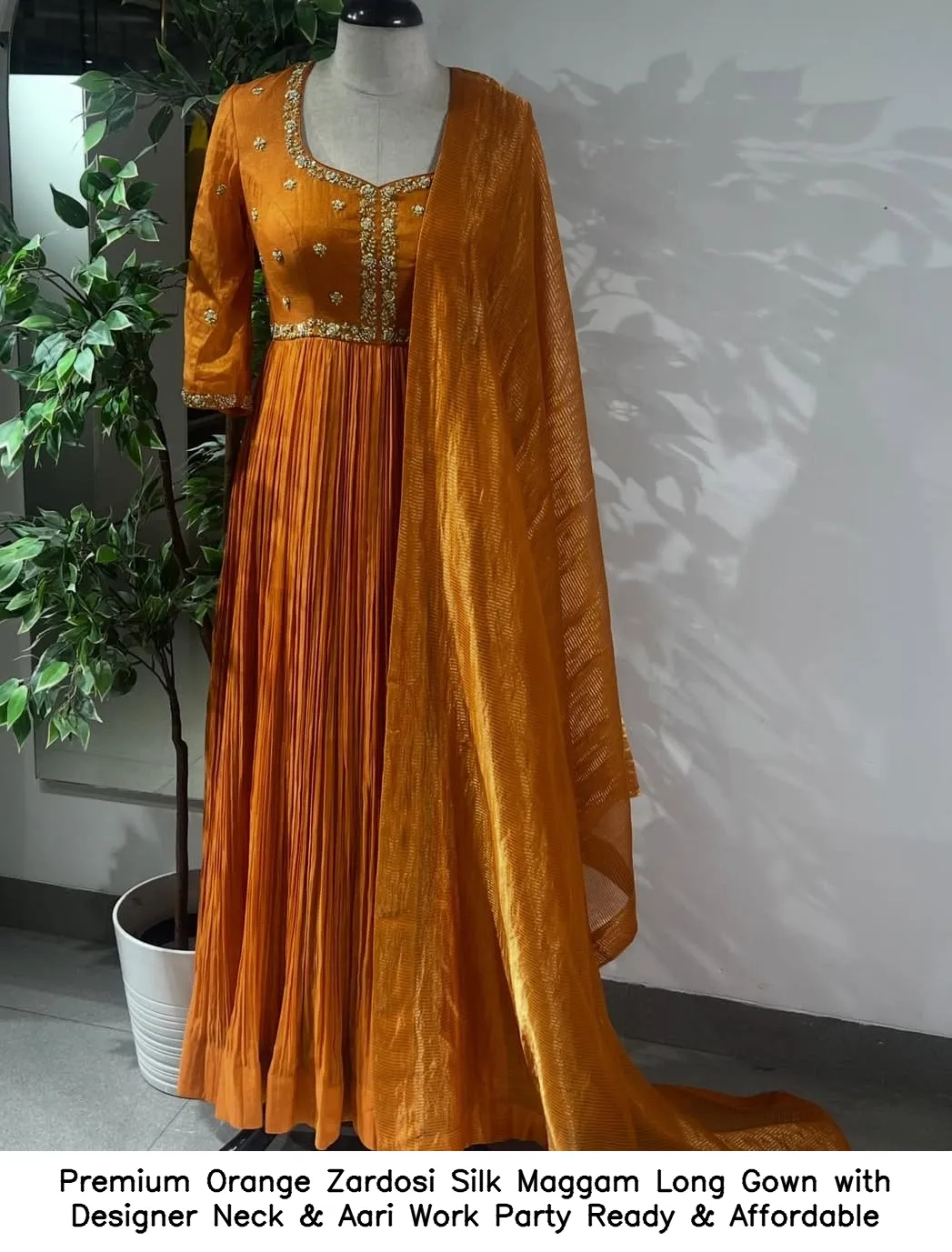 Premium Orange Zardosi Silk Maggam Long Gown with Designer Neck & Aari Work – Party Ready & Affordable