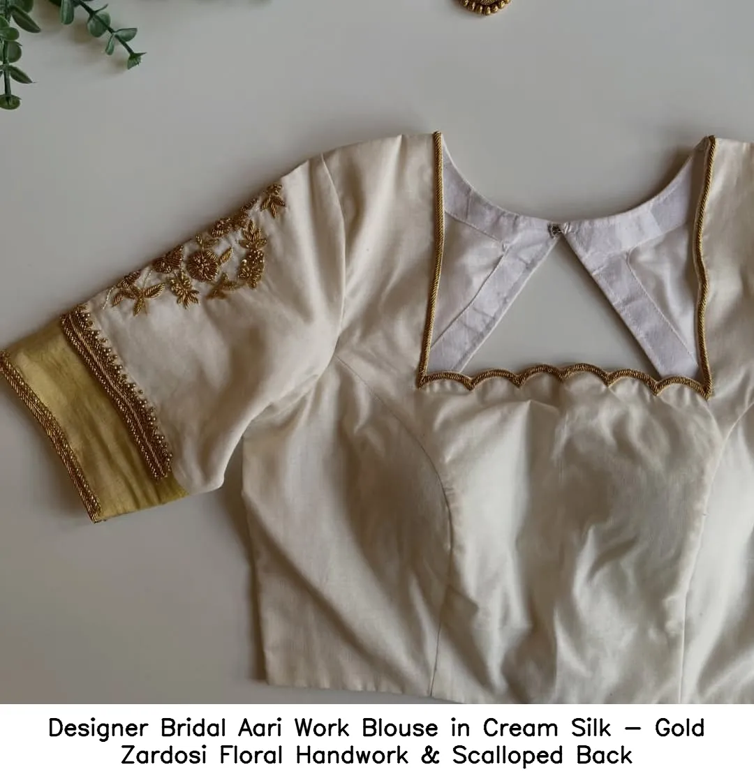 Designer Bridal Aari Work Blouse in Cream Silk - Gold Zardosi Floral Handwork & Scalloped Back