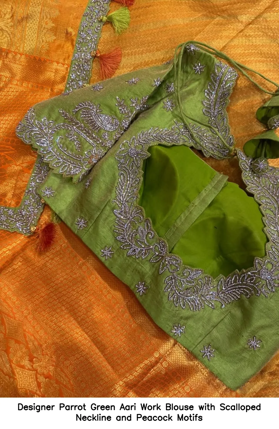 Designer Parrot Green Aari Work Blouse with Scalloped Neckline and Peacock Motifs