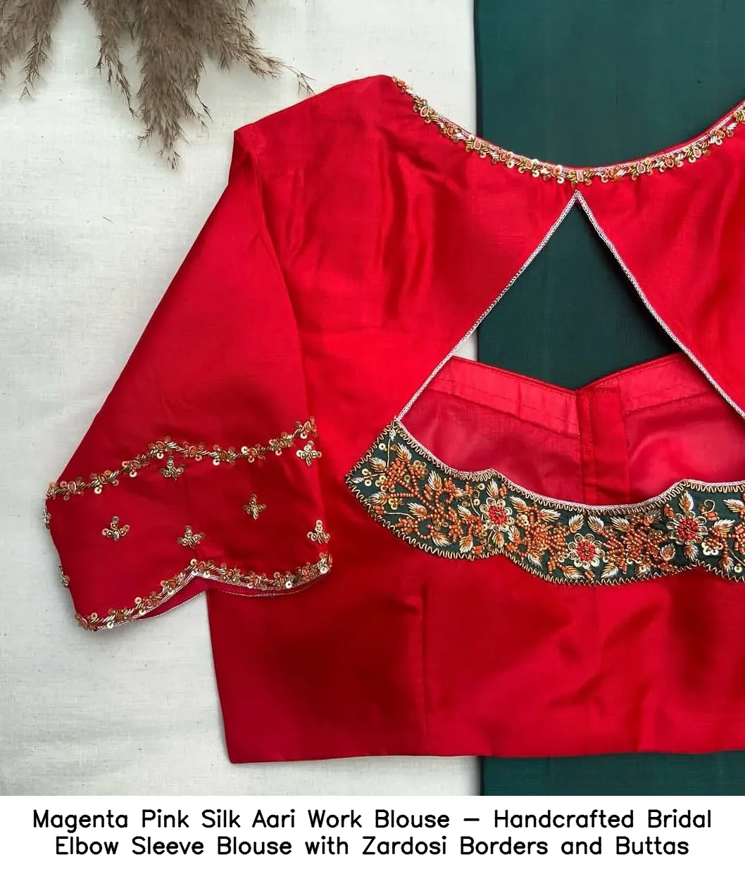 Magenta Pink Silk Aari Work Blouse - Handcrafted Bridal Elbow Sleeve Blouse with Zardosi Borders and Buttas