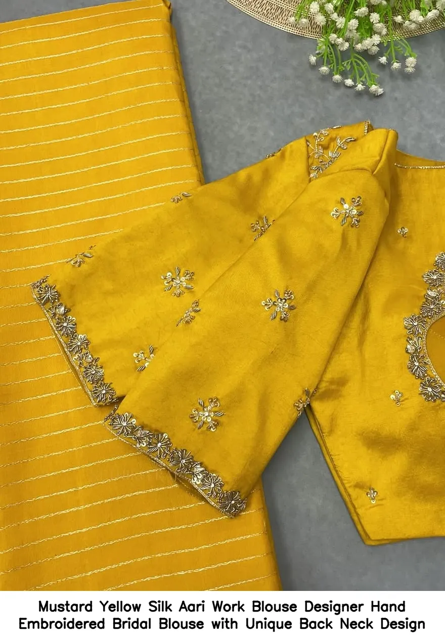 Mustard Yellow Silk Aari Work Blouse – Designer Hand Embroidered Bridal Blouse with Unique Back Neck Design