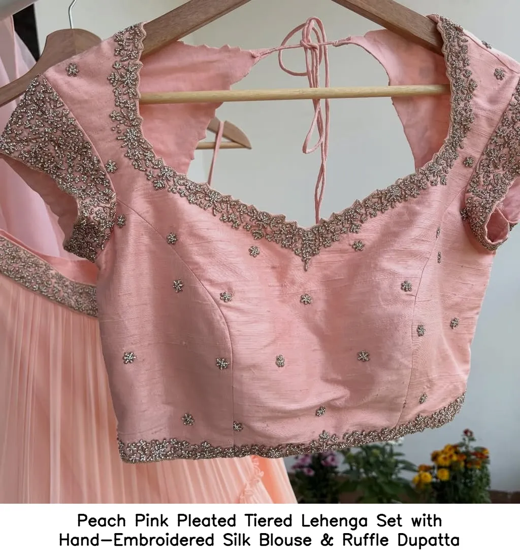 Peach Pink Pleated Tiered Lehenga Set with Hand-Embroidered Silk Blouse & Ruffle Dupatta