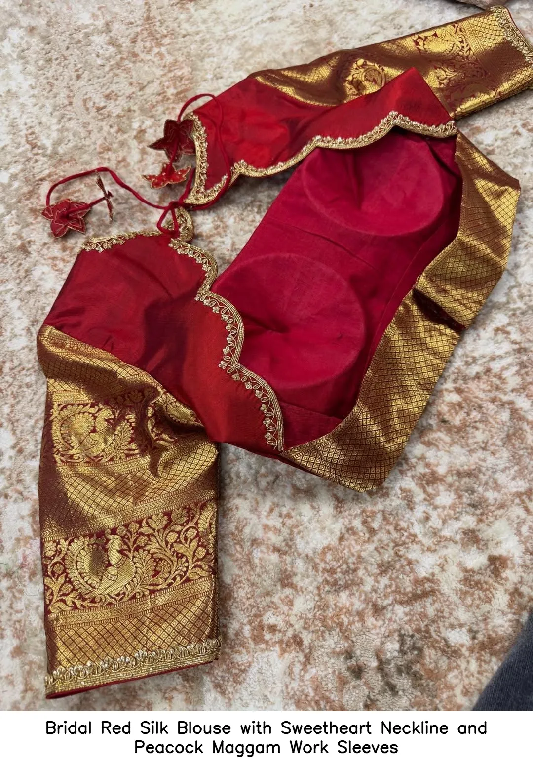 Bridal Red Silk Blouse with Sweetheart Neckline and Peacock Maggam Work Sleeves