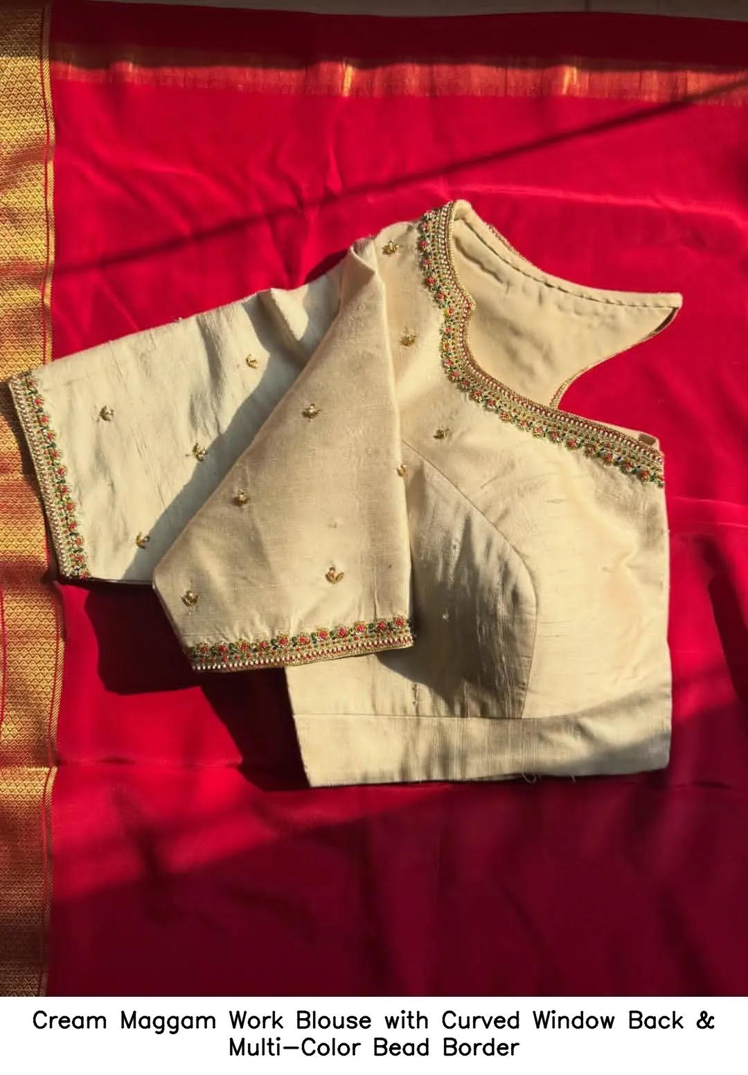 Cream Maggam Work Blouse with Curved Window Back & Multi-Color Bead Border