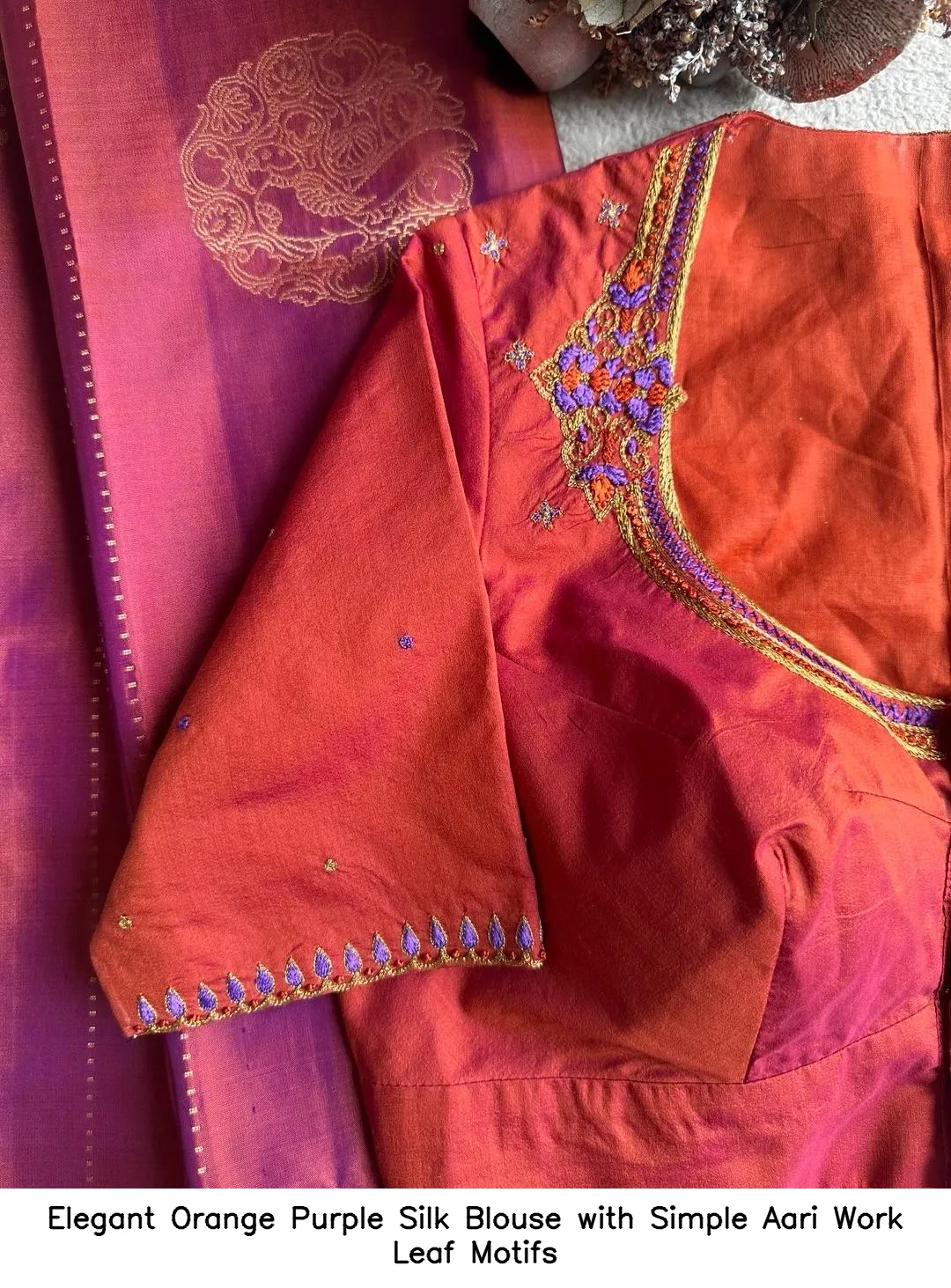 Elegant Orange Purple Silk Blouse with Simple Aari Work Leaf Motifs
