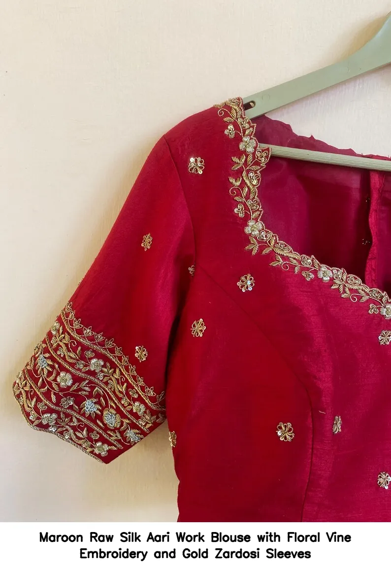 Maroon Raw Silk Aari Work Blouse with Floral Vine Embroidery and Gold Zardosi Sleeves