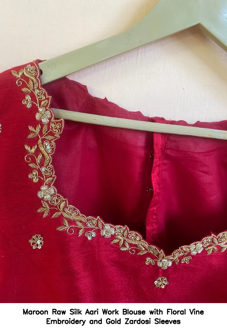 Maroon Raw Silk Aari Work Blouse with Floral Vine Embroidery and Gold Zardosi Sleeves