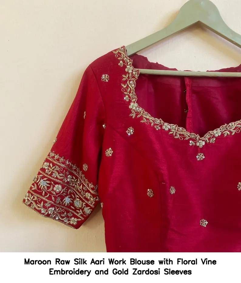 Maroon Raw Silk Aari Work Blouse with Floral Vine Embroidery and Gold Zardosi Sleeves