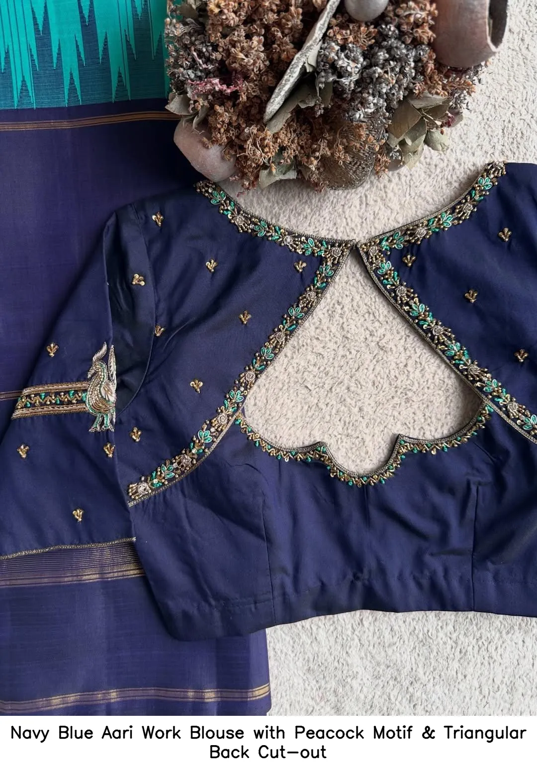 Navy Blue Aari Work Blouse with Peacock Motif & Triangular Back Cut-out