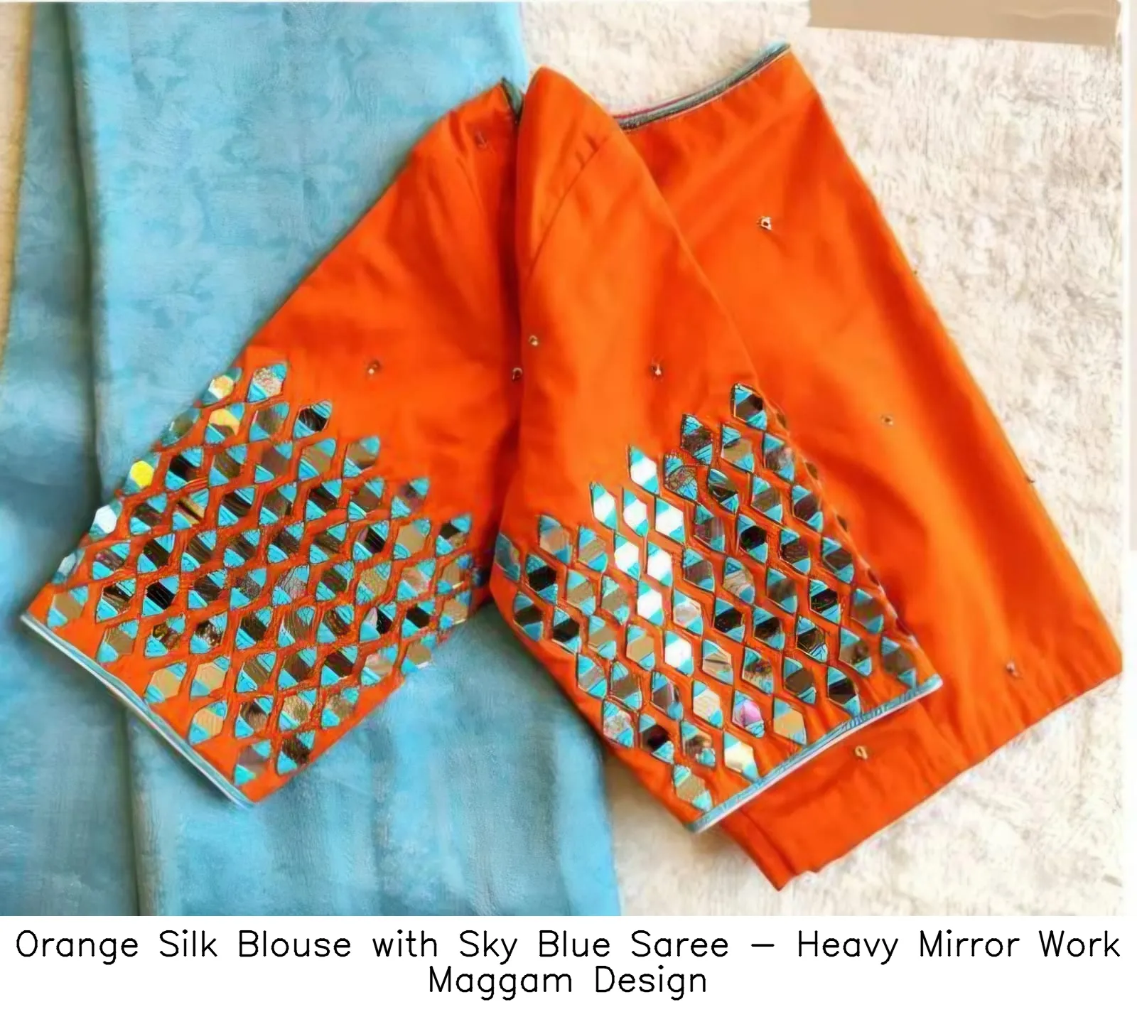 Orange Silk Blouse with Sky Blue Saree - Heavy Mirror Work Maggam Design