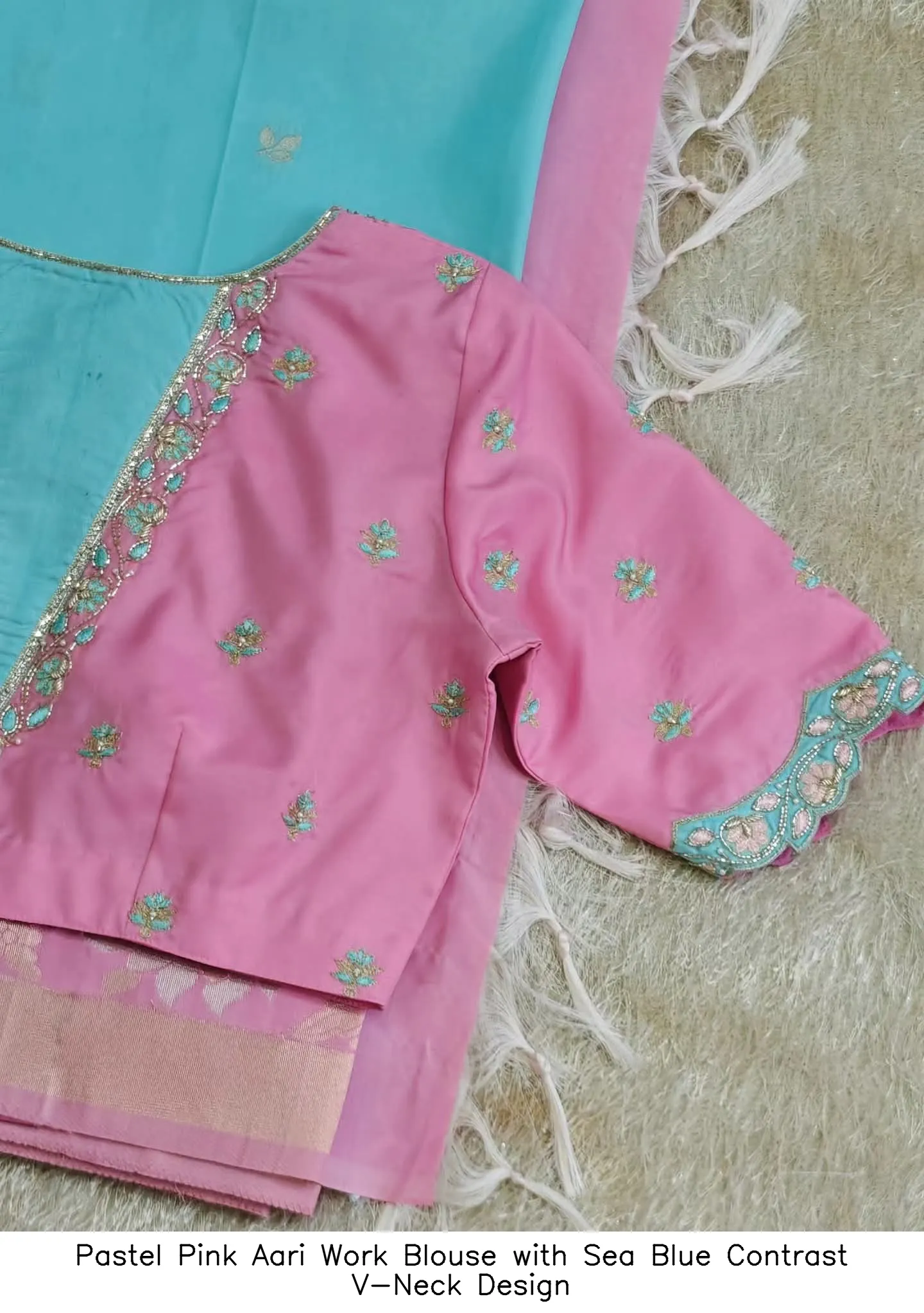 Pastel Pink Aari Work Blouse with Sea Blue Contrast V-Neck Design