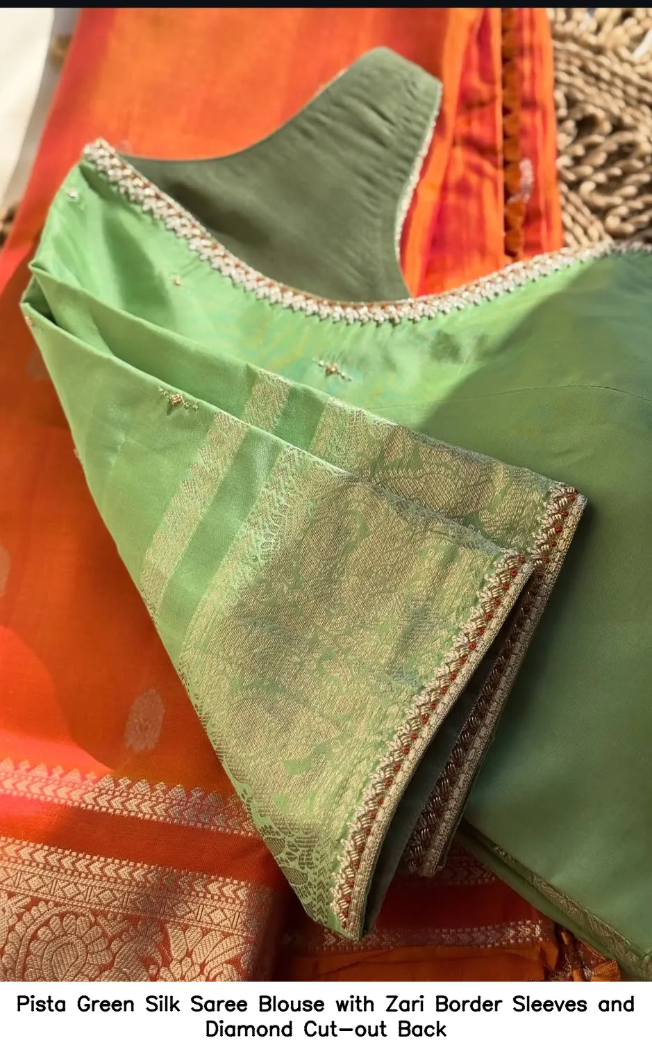 Pista Green Silk Saree Blouse with Zari Border Sleeves and Diamond Cut-out Back