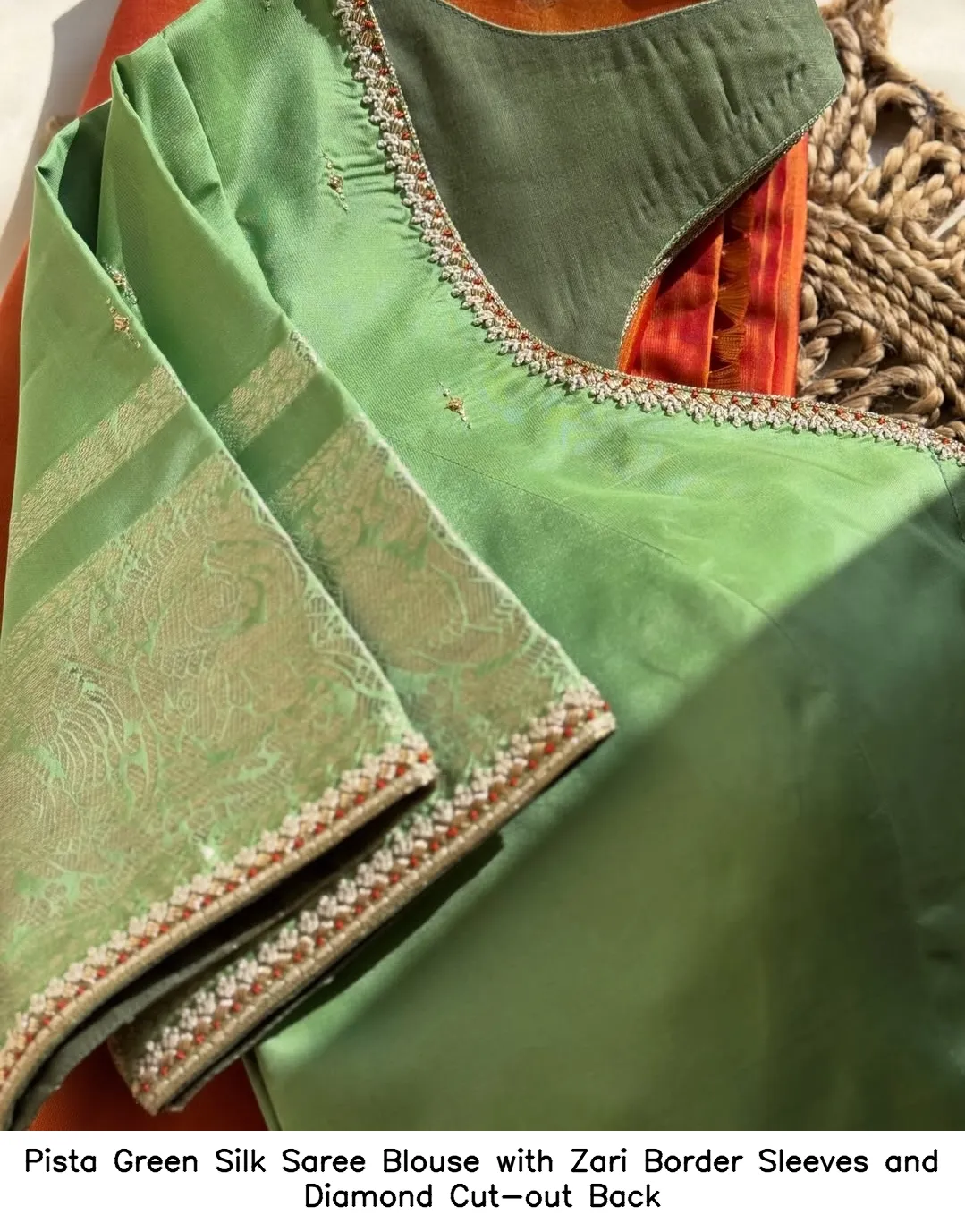Pista Green Silk Saree Blouse with Zari Border Sleeves and Diamond Cut-out Back