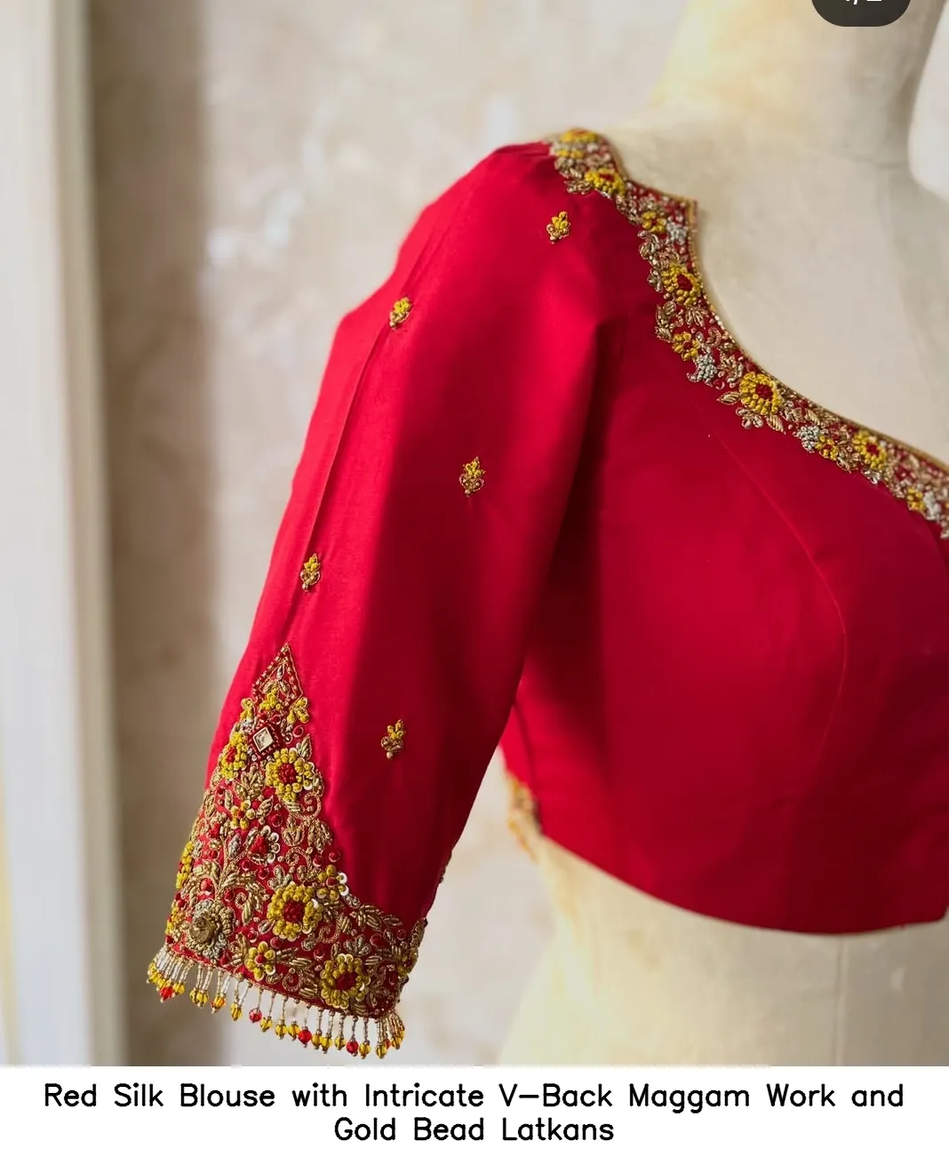 Red Silk Blouse with Intricate V-Back Maggam Work and Gold Bead Latkans