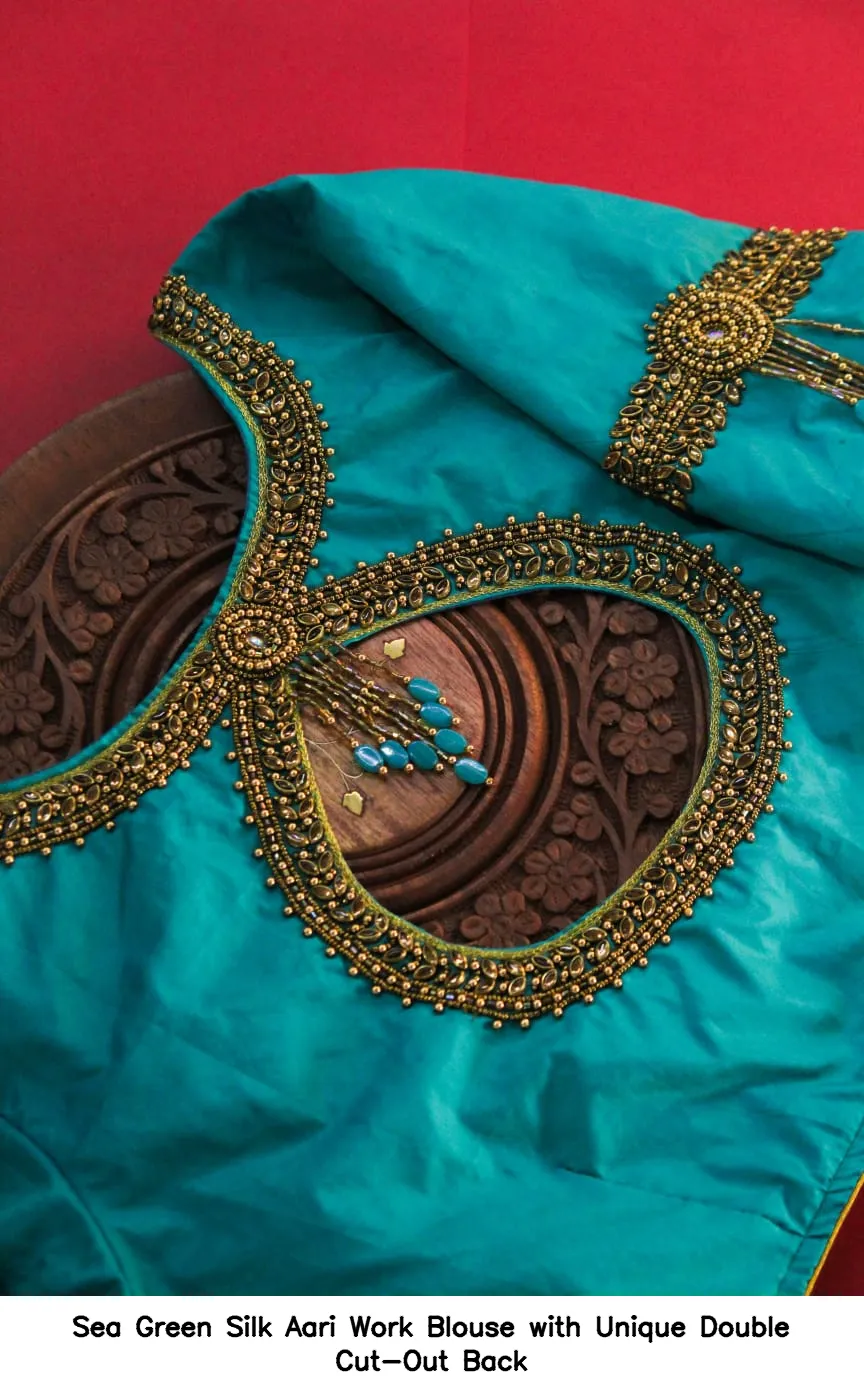 Sea Green Silk Aari Work Blouse with Unique Double Cut-Out Back