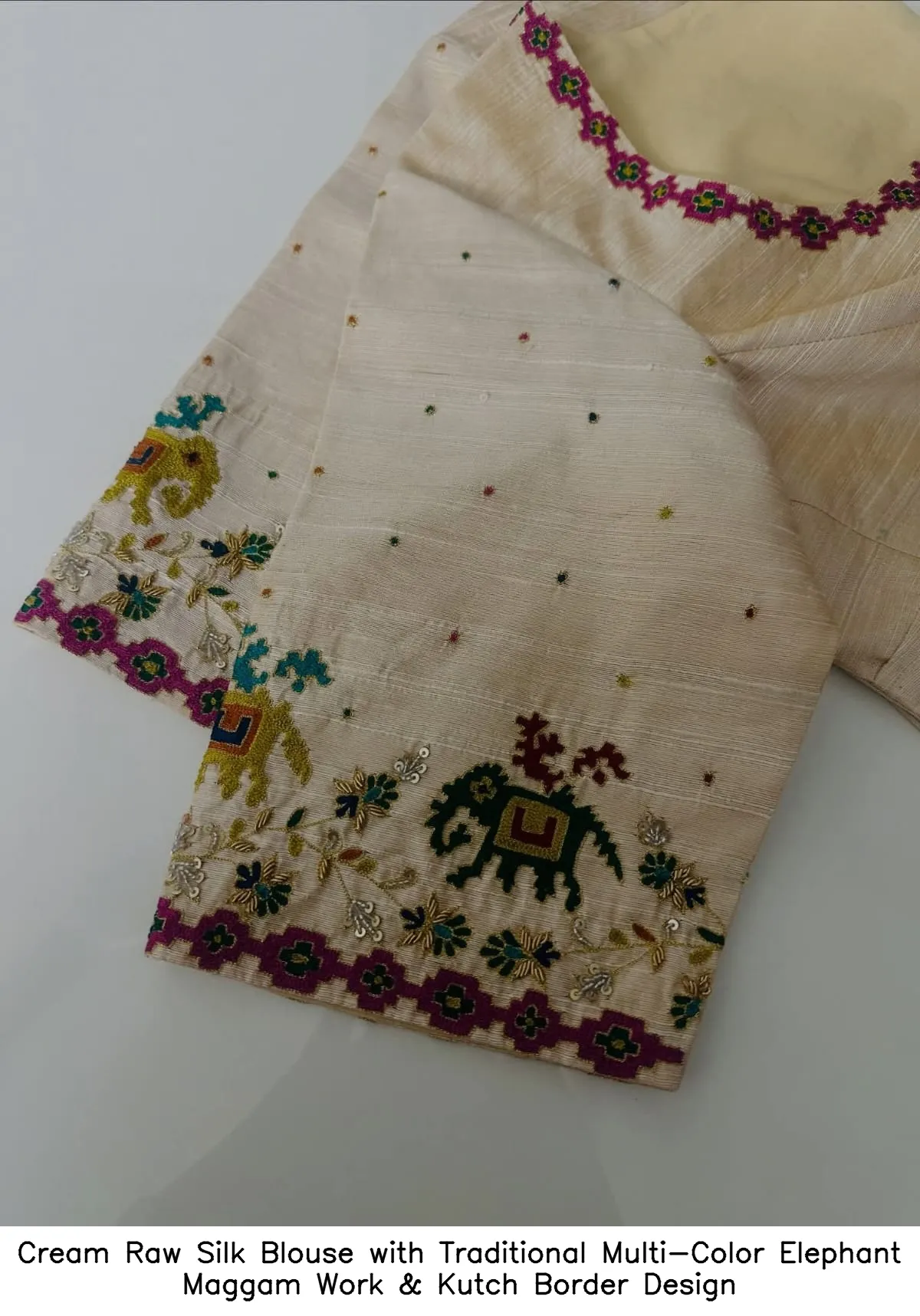 Cream Raw Silk Blouse with Traditional Multi-Color Elephant Maggam Work & Kutch Border Design