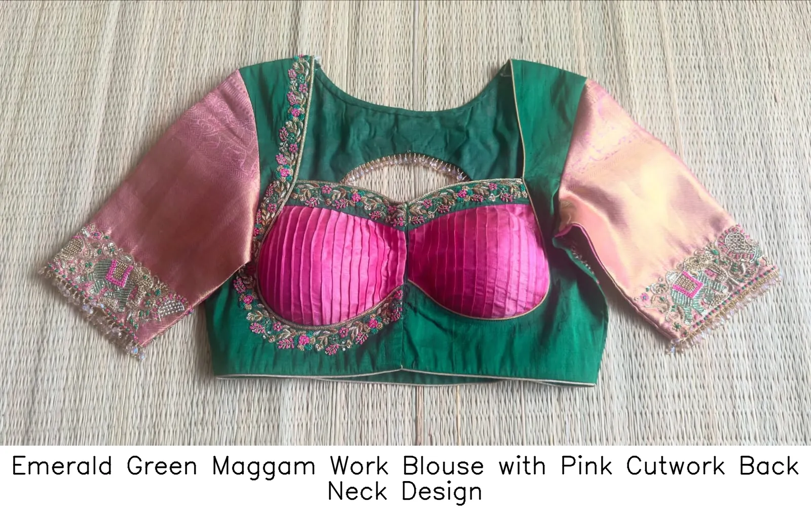 Emerald Green Maggam Work Blouse with Pink Cutwork Back Neck Design