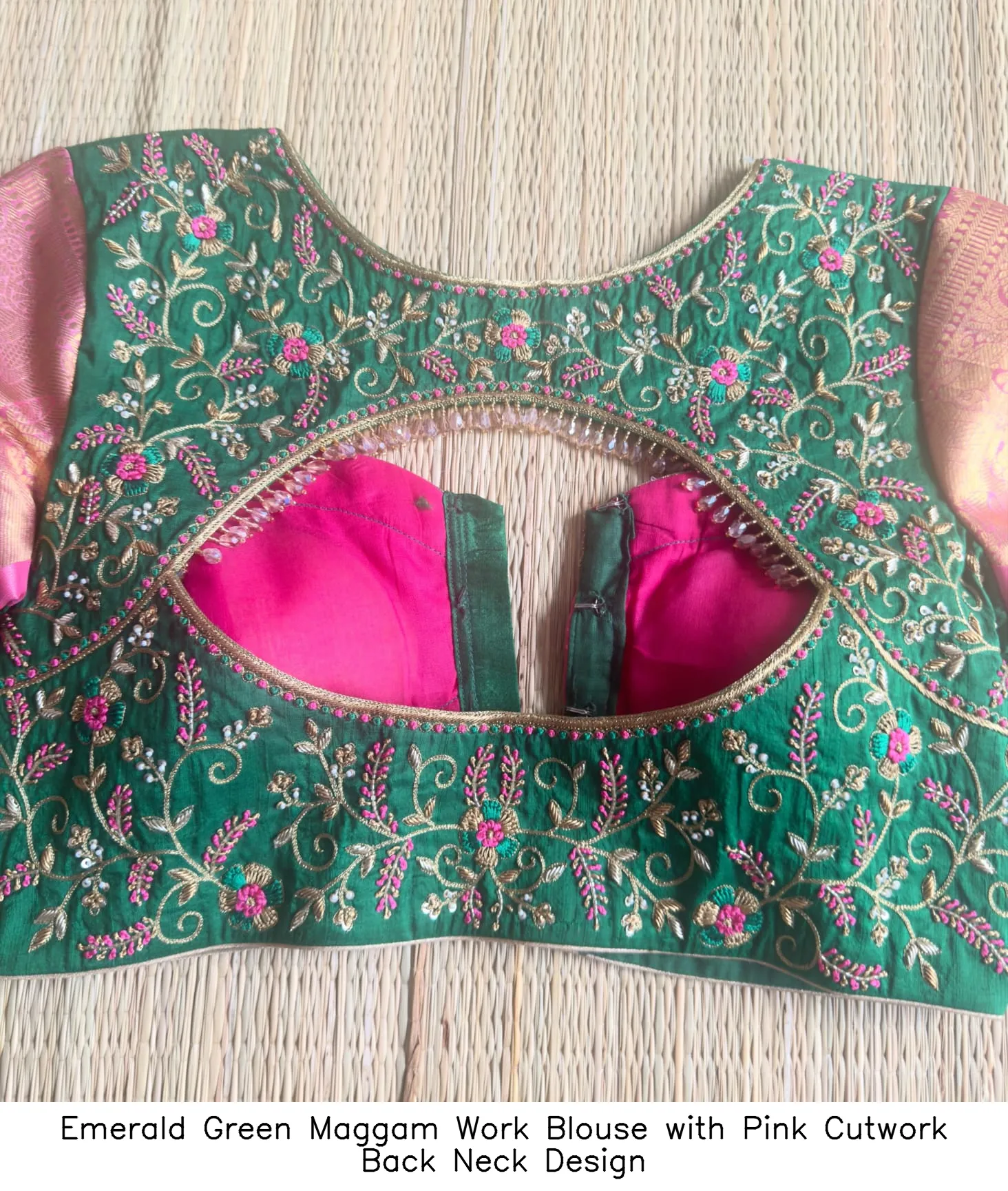 Emerald Green Maggam Work Blouse with Pink Cutwork Back Neck Design