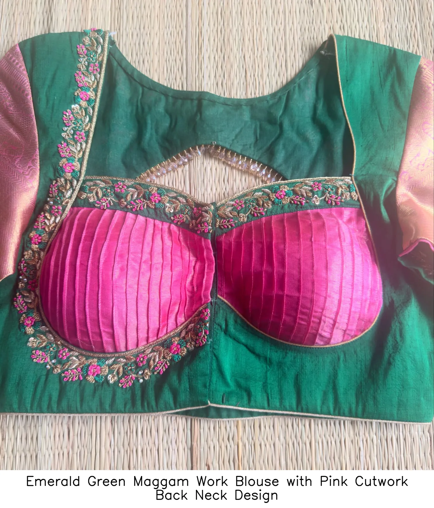 Emerald Green Maggam Work Blouse with Pink Cutwork Back Neck Design