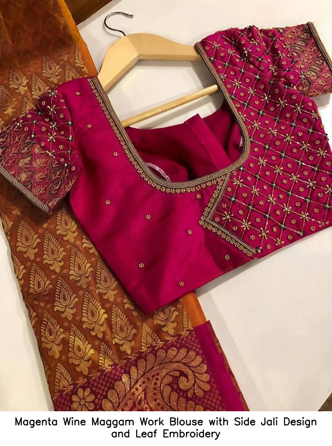 Magenta Wine Maggam Work Blouse with Side Jali Design and Leaf Embroidery
