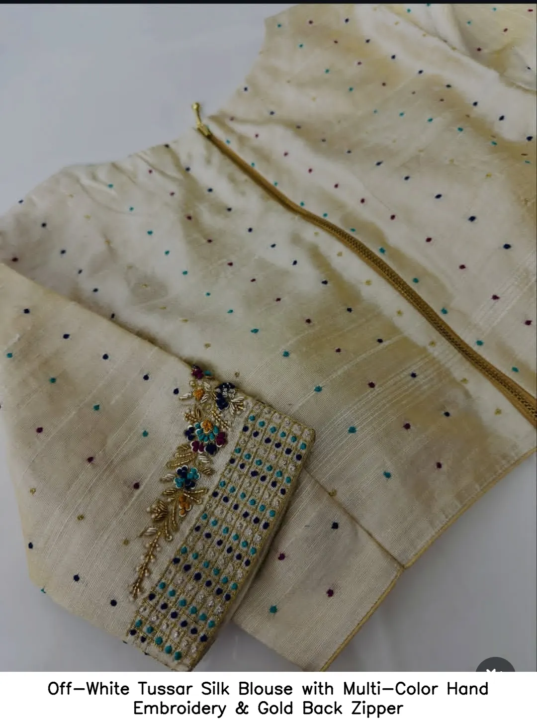 Off-White Tussar Silk Blouse with Multi-Color Hand Embroidery & Gold Back Zipper