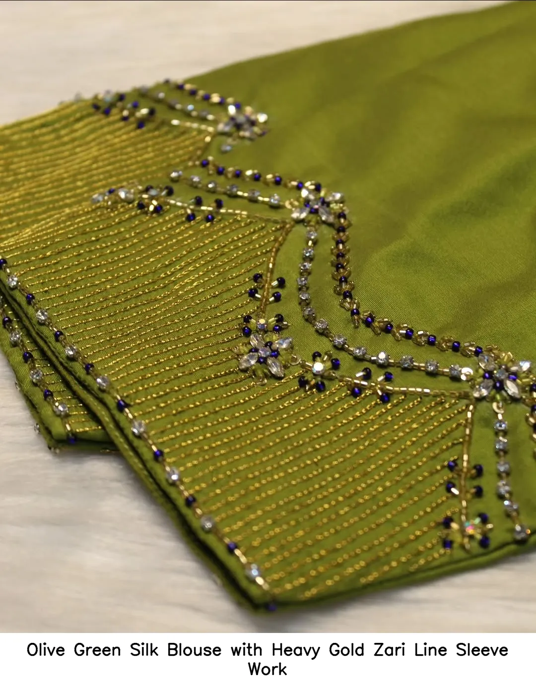 Olive Green Silk Blouse with Heavy Gold Zari Line Sleeve Work