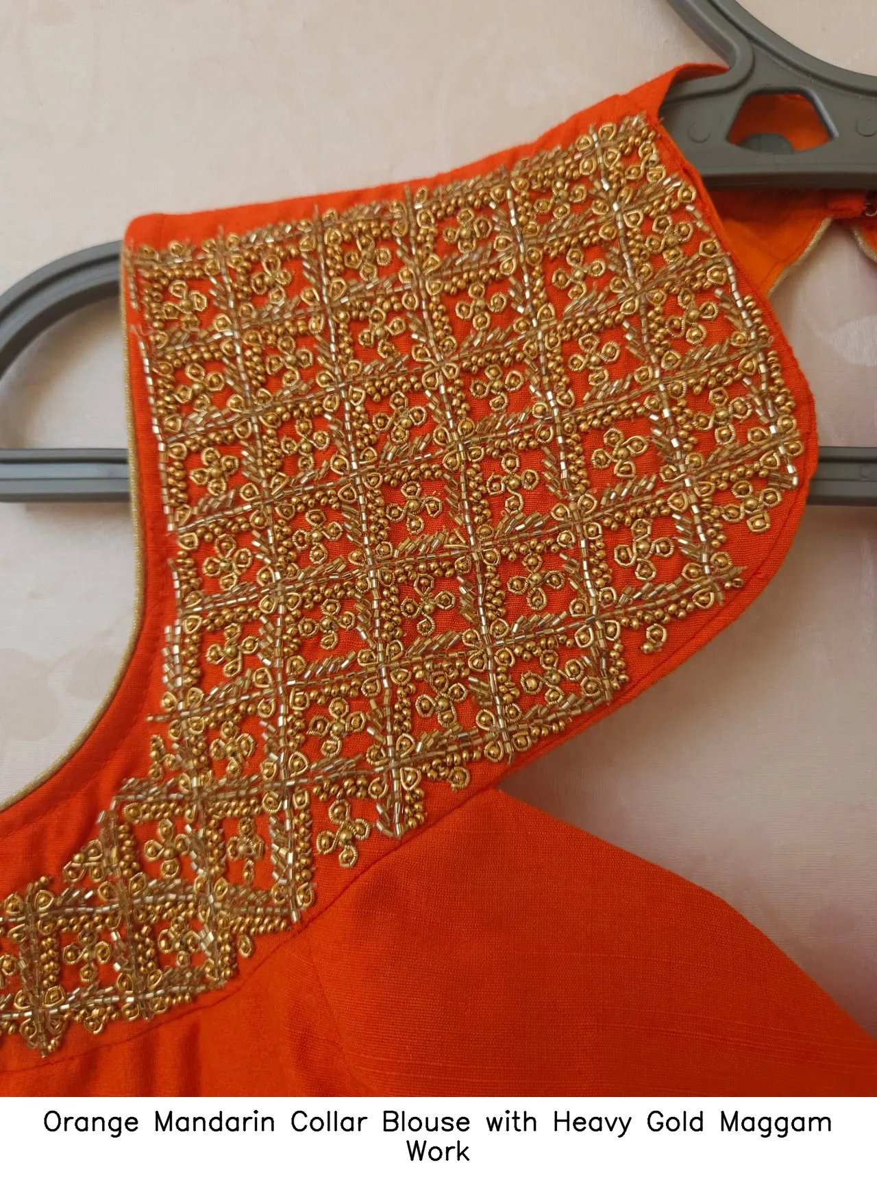Orange Mandarin Collar Blouse with Heavy Gold Maggam Work