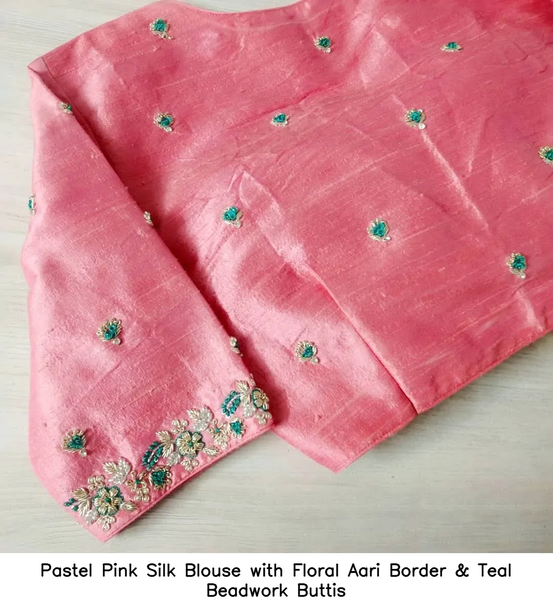 Pastel Pink Silk Blouse with Floral Aari Border & Teal Beadwork Buttis