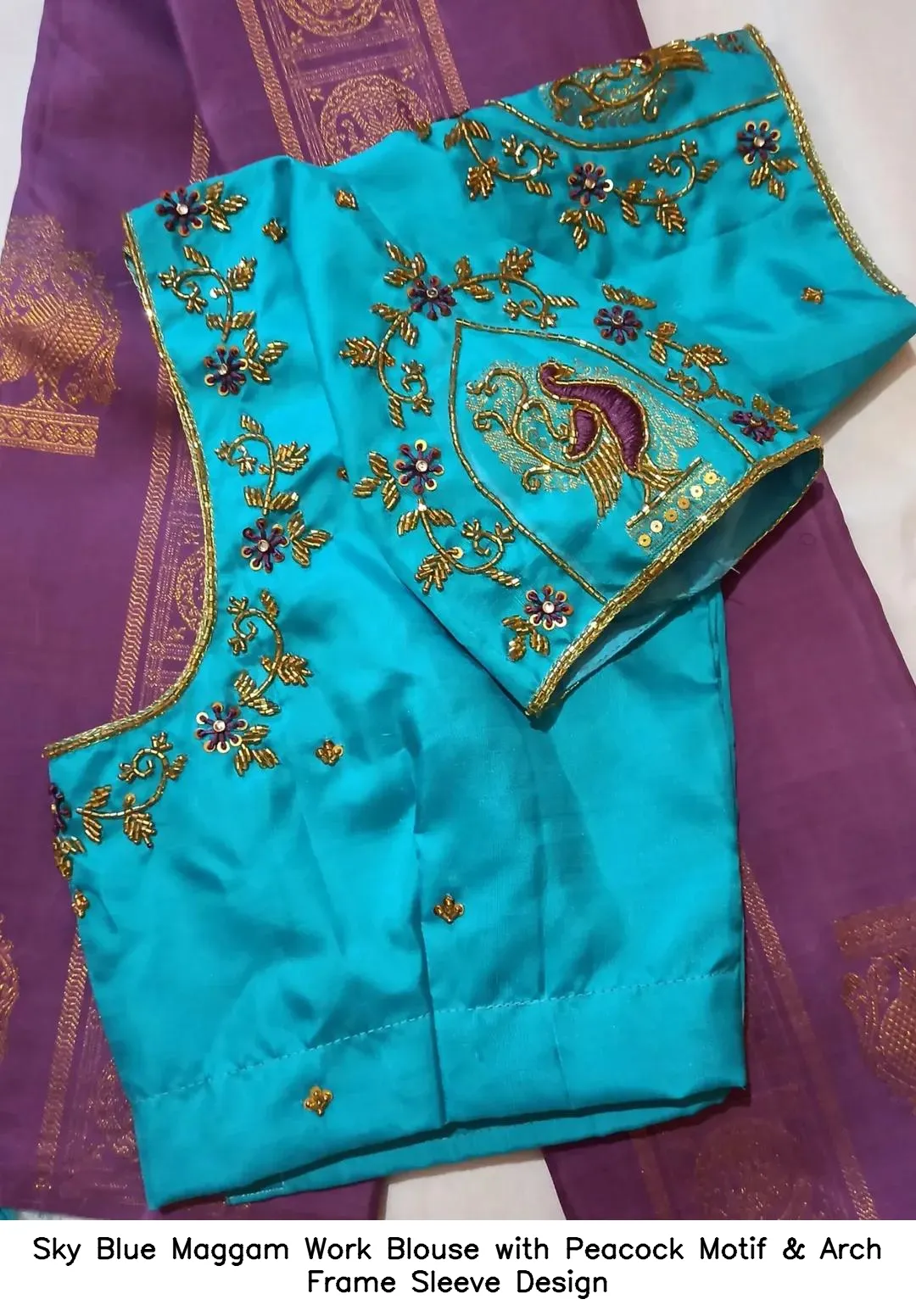 Sky Blue Maggam Work Blouse with Peacock Motif & Arch Frame Sleeve Design