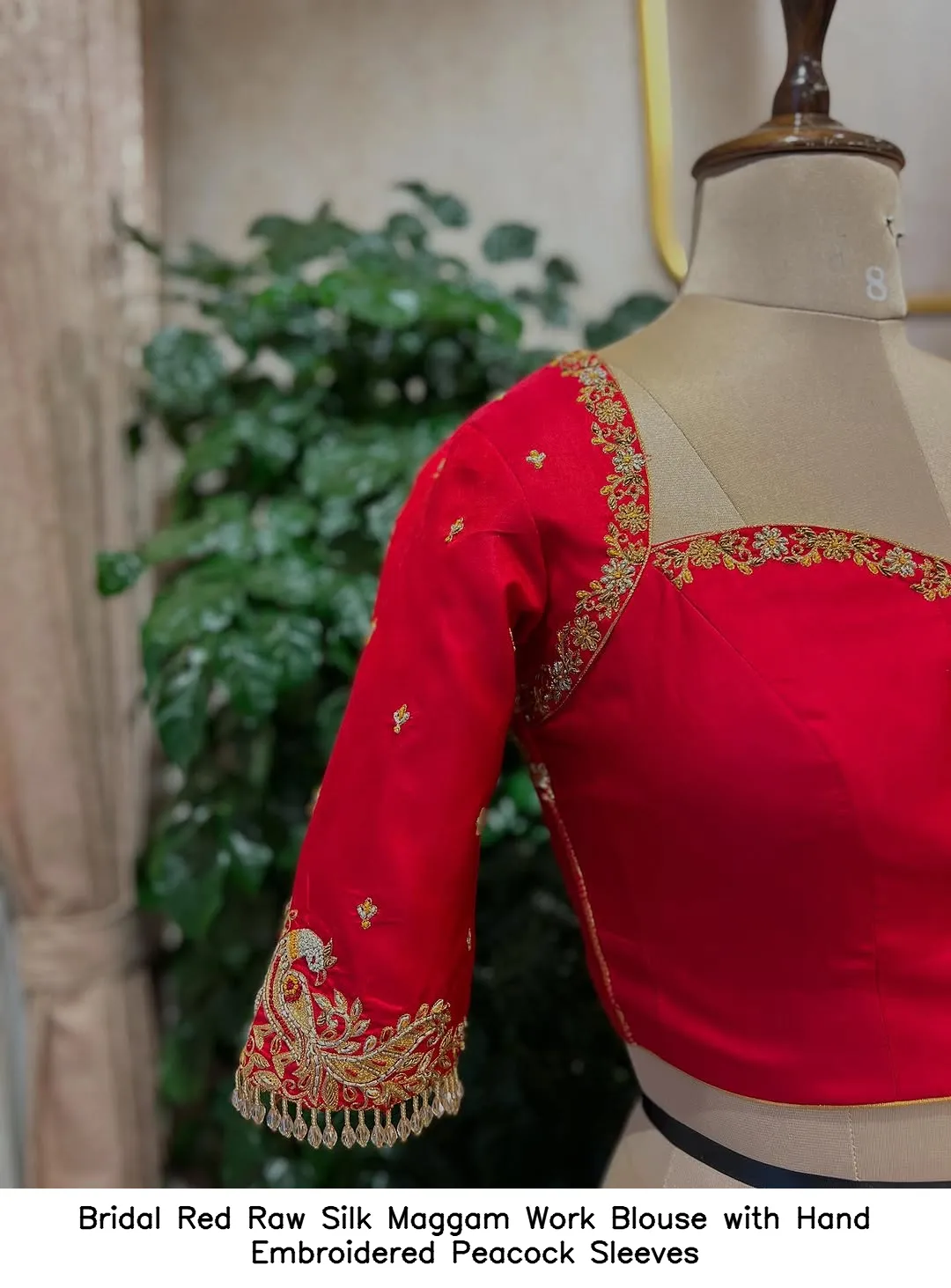 Bridal Red Raw Silk Maggam Work Blouse with Hand Embroidered Peacock Sleeves