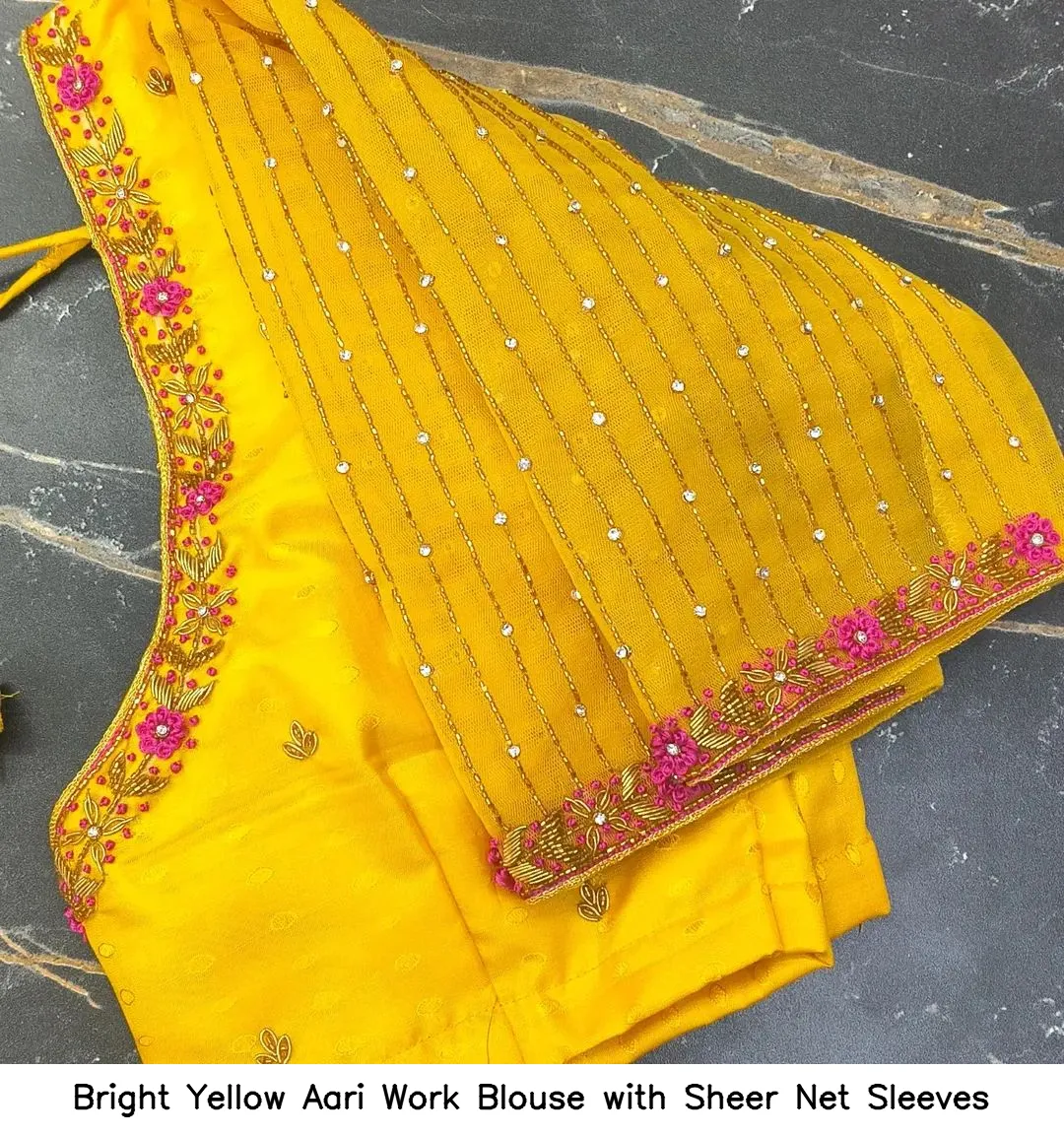 Bright Yellow Aari Work Blouse with Sheer Net Sleeves
