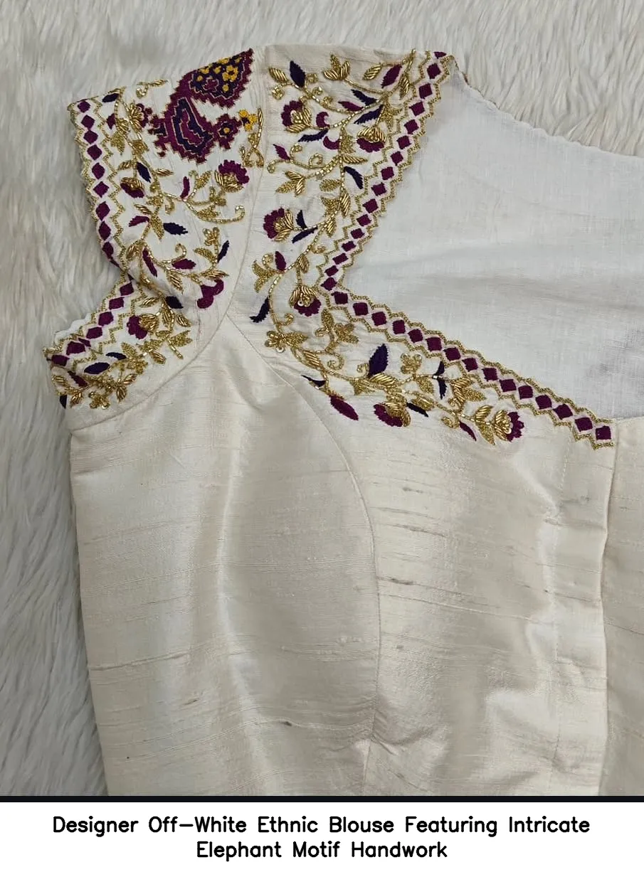 Designer Off-White Ethnic Blouse Featuring Intricate Elephant Motif Handwork